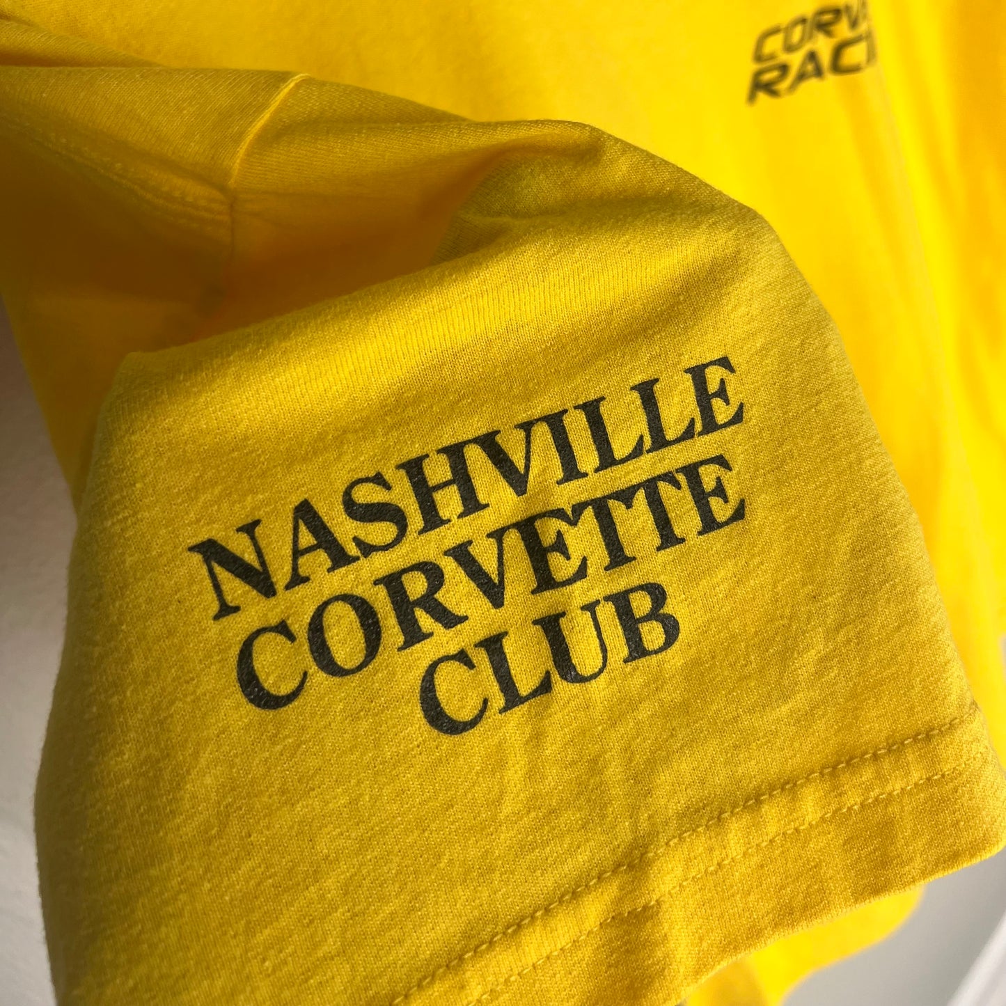 Close-up of Nashville Corvette Club print on sleeve