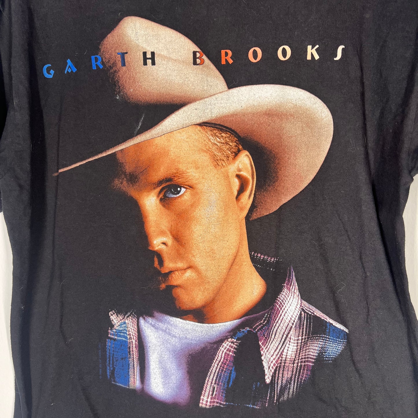 Close-up of Garth Brooks portrait print on the tee