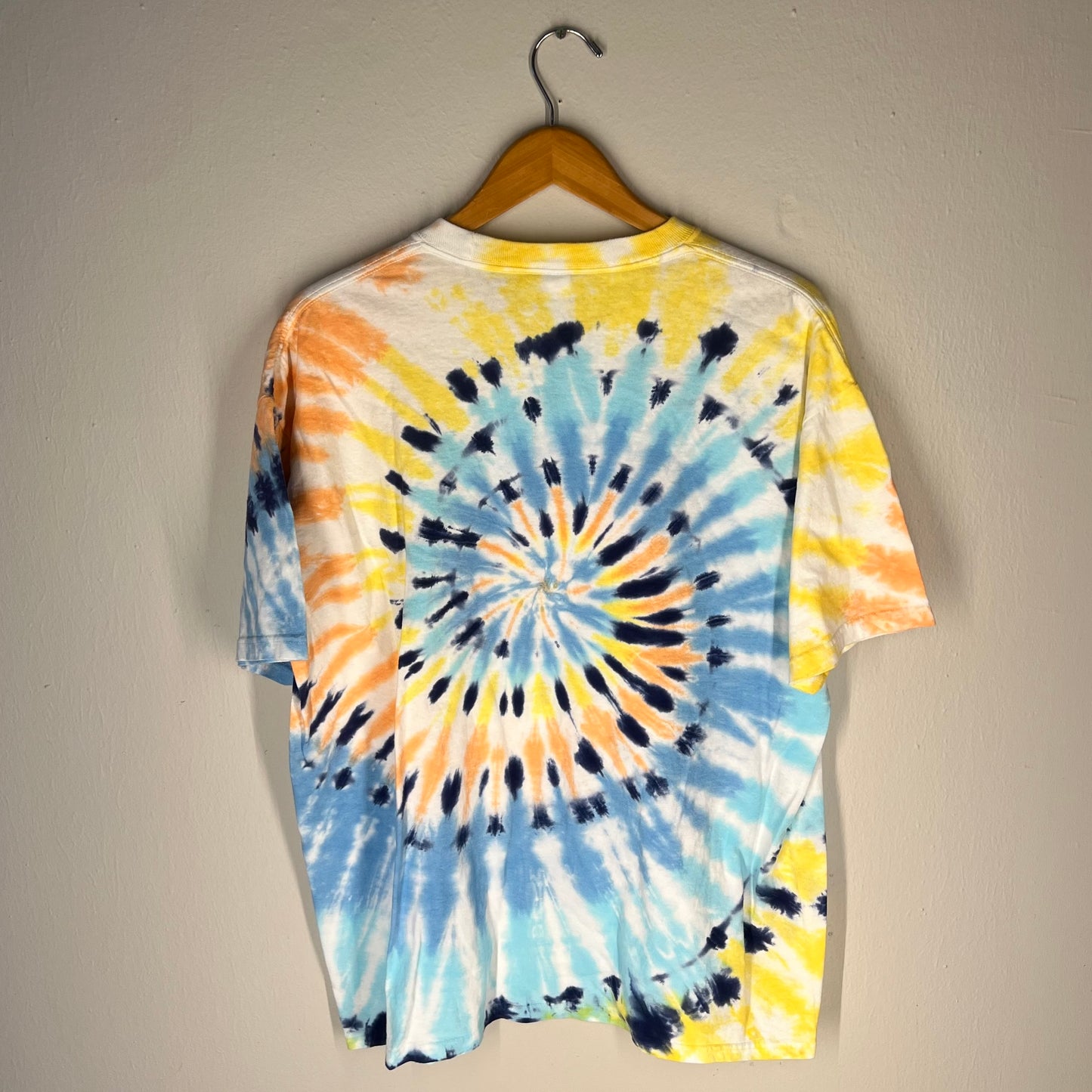 Back view of Grateful Dead tie-dye shirt with spiral rainbow pattern
