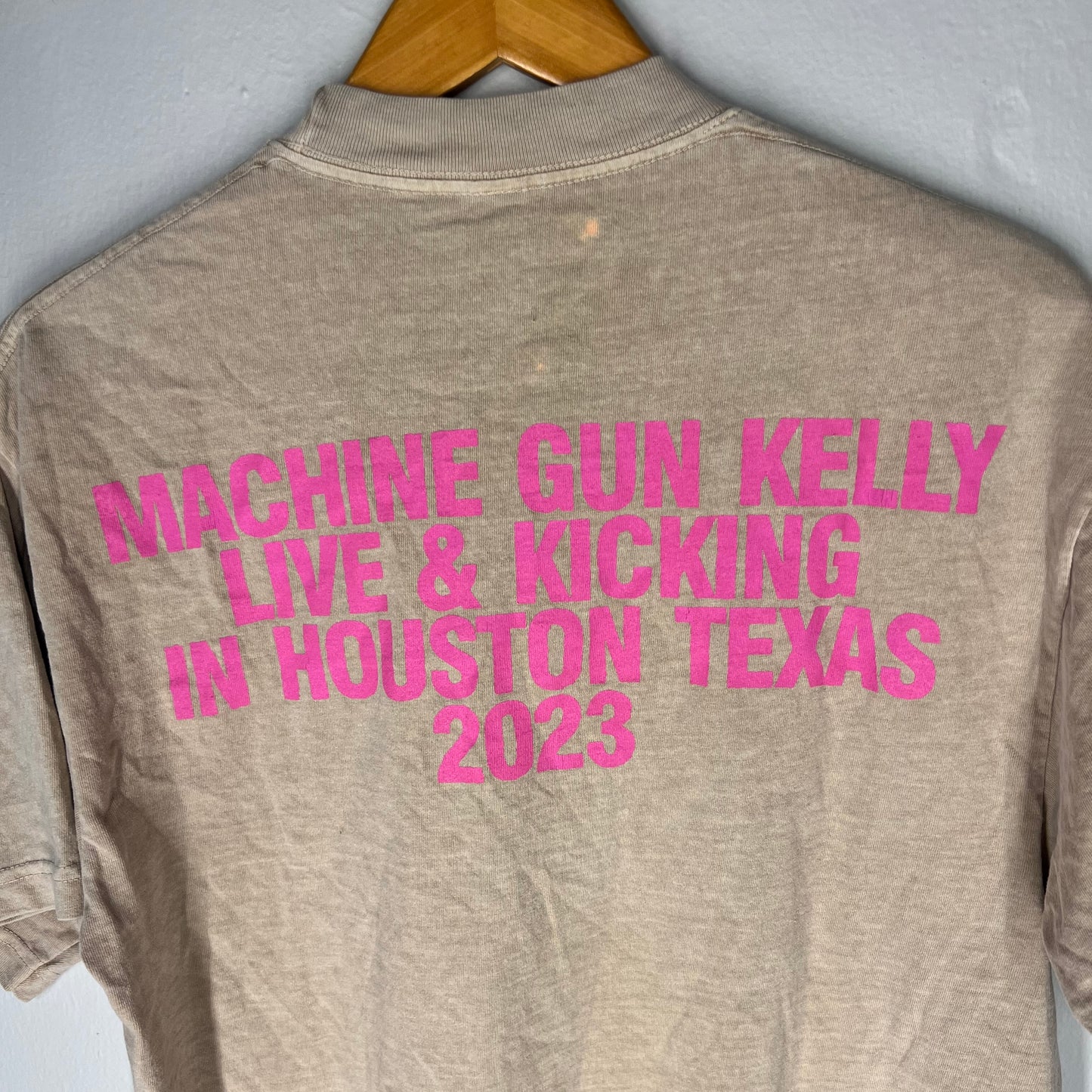 Close-up of pink MGK Live & Kicking in Houston Texas 2023 print