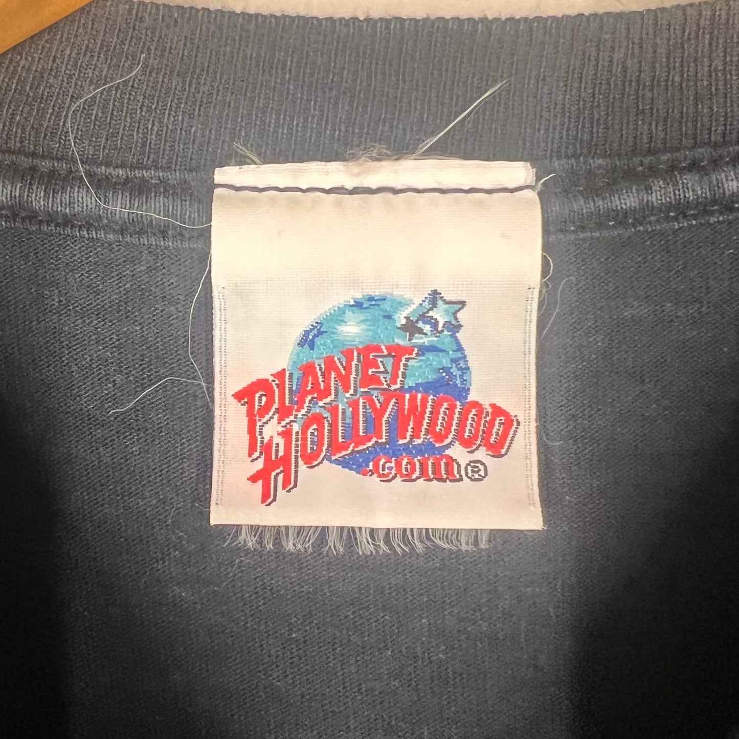 Woven Planet Hollywood brand neck tag inside collar.