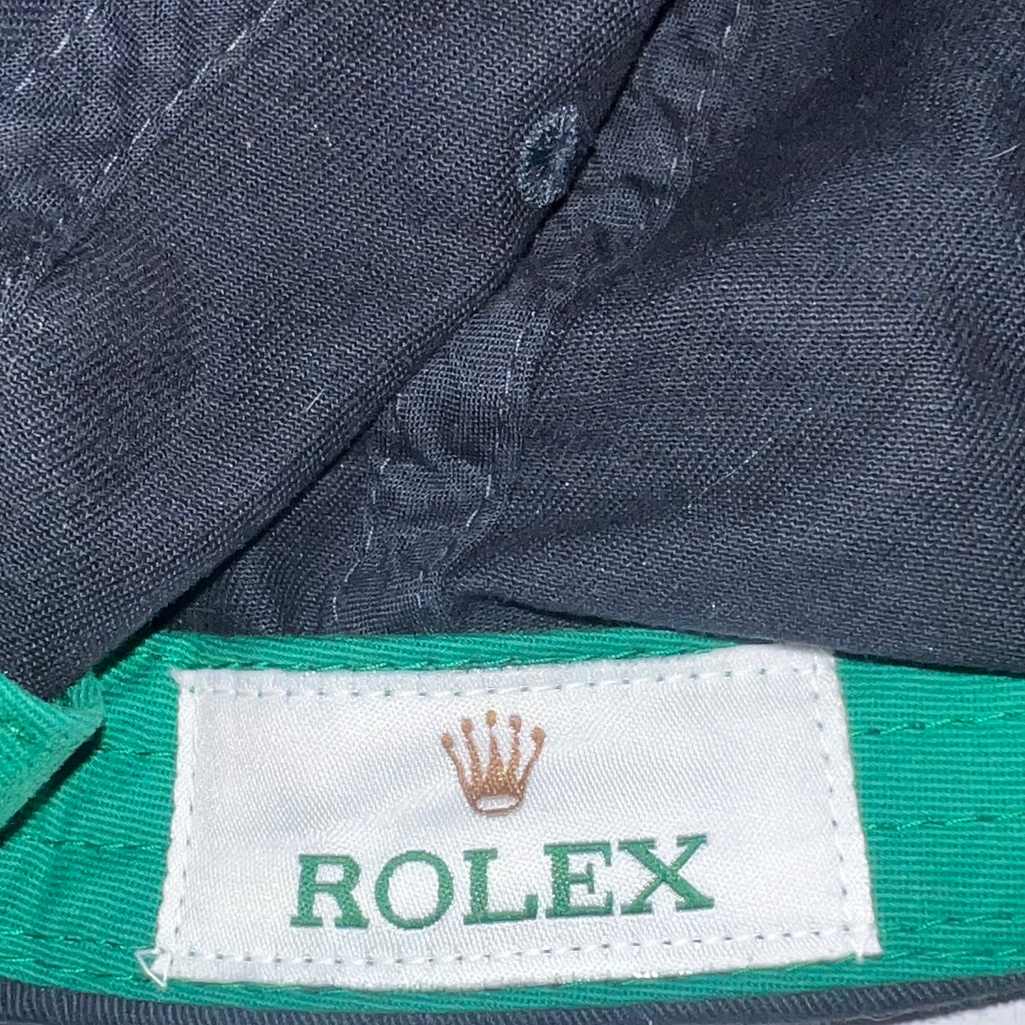 Close-up of Rolex woven brand label inside