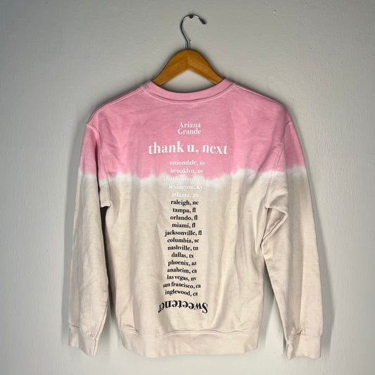 Back view with Ariana Grande “thank u, next” text and tour stop list