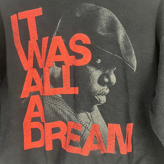 Close-up of red text “It Was All a Dream” with Biggie Smalls portrait graphic