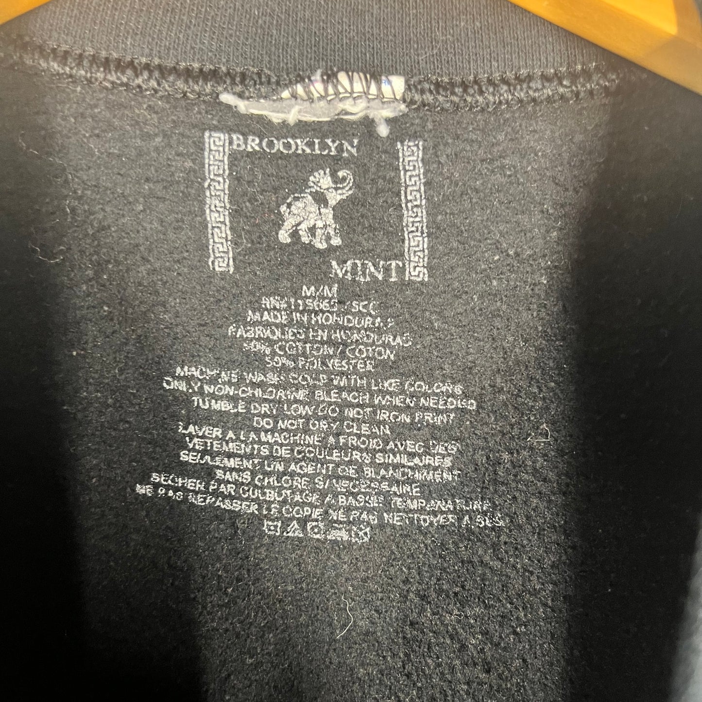 Brooklyn Mint printed neck tag with size M and fabric details