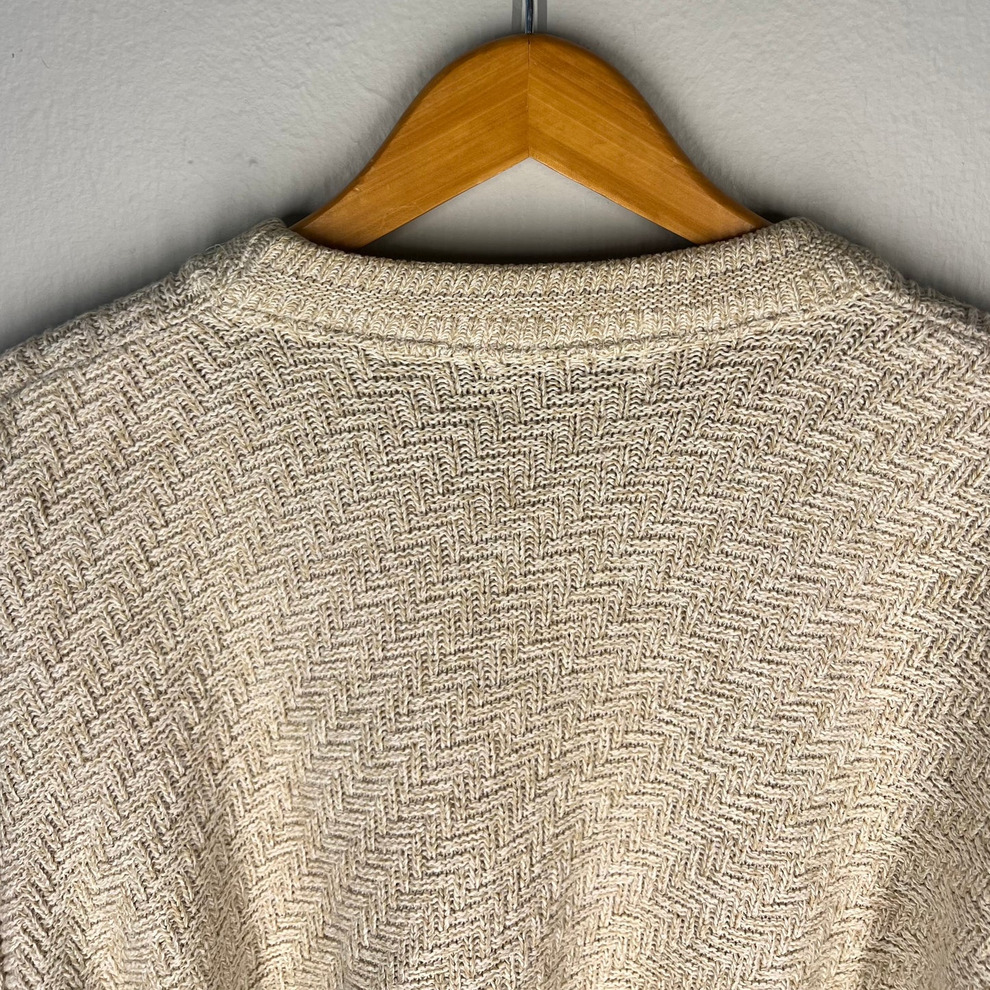 Close-up of back neckline and herringbone knit pattern