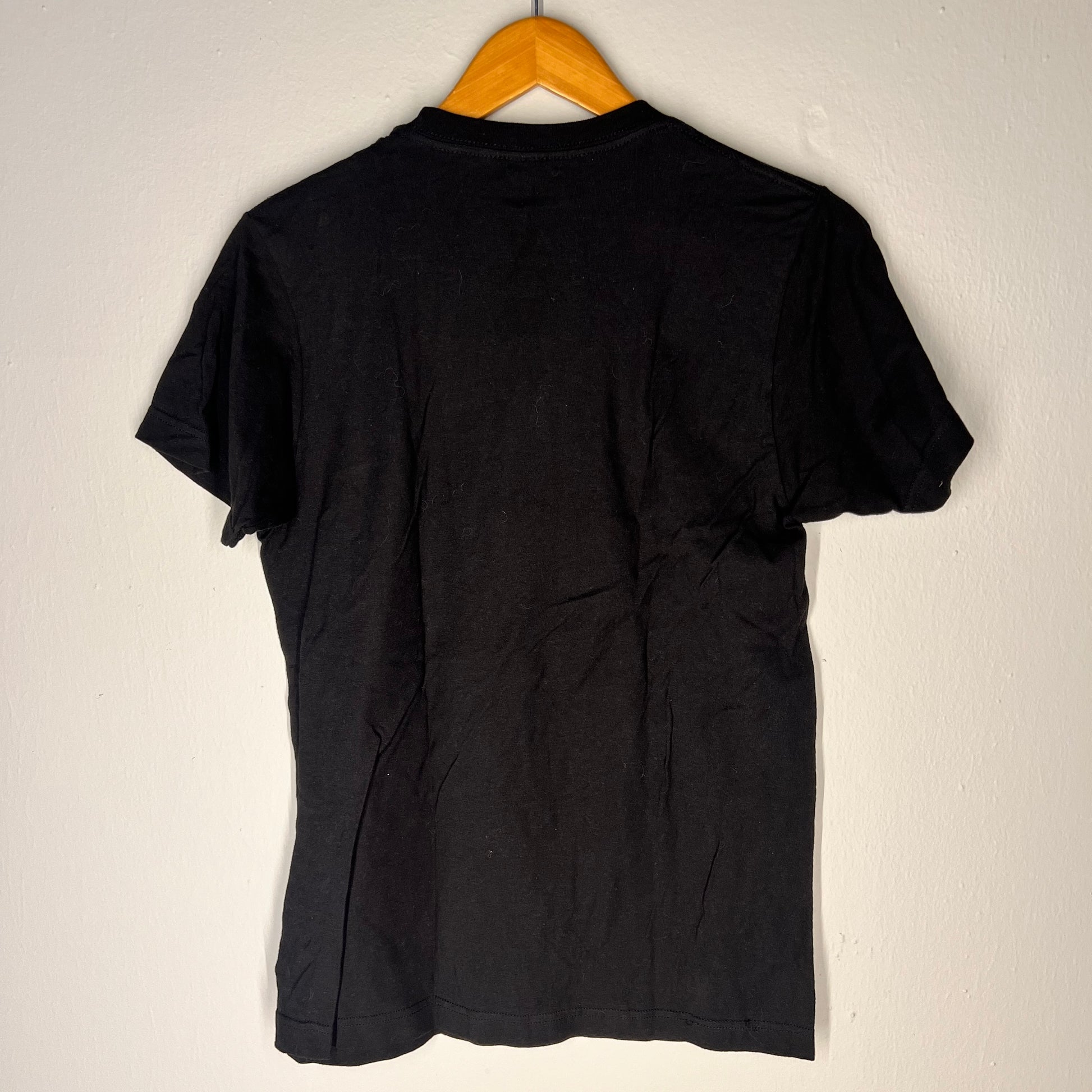 Backside of Billie Eilish tee – solid black with no graphic