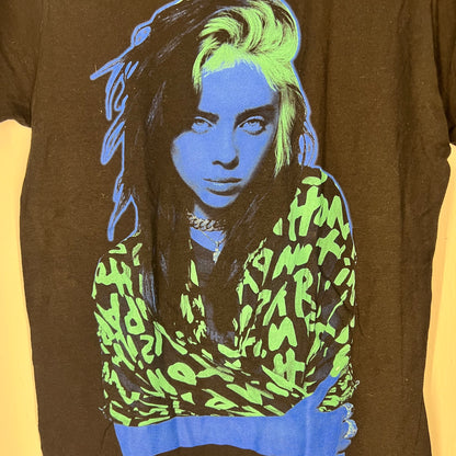 Close-up of Billie Eilish neon green and blue graphic print