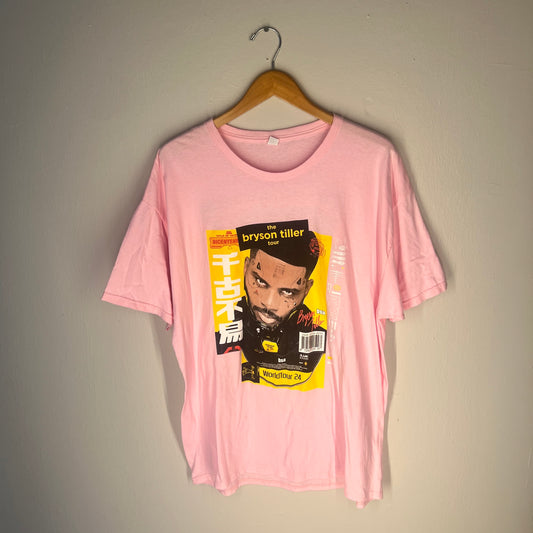 Front view of pink Bryson Tiller World Tour 24 graphic T‑shirt on hanger