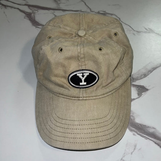 Front view of vintage BYU khaki strapback hat with oval Y logo