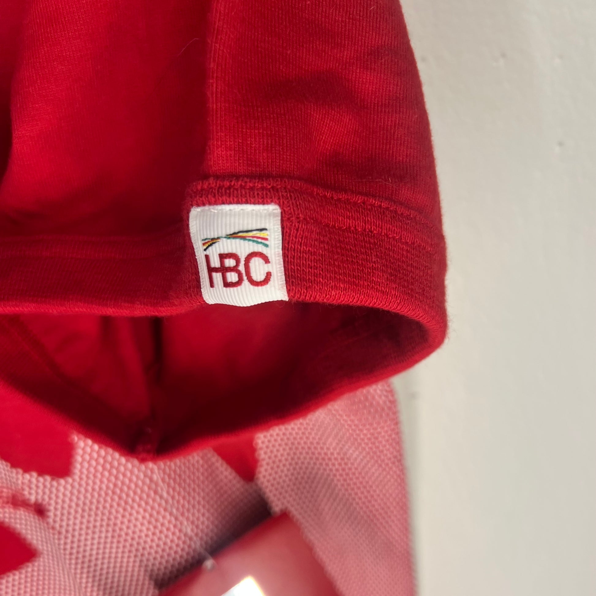 Sleeve detail with HBC woven tab branding.