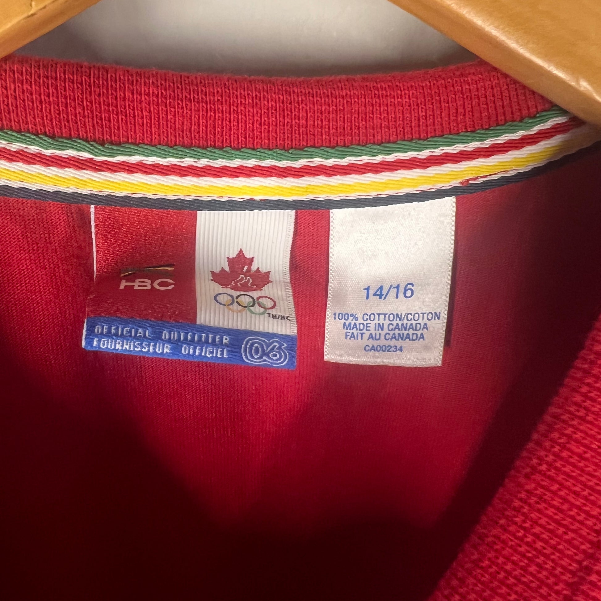 Neck tag showing HBC and 2006 Canadian Olympic Team branding, size Youth XL, made in Canada.