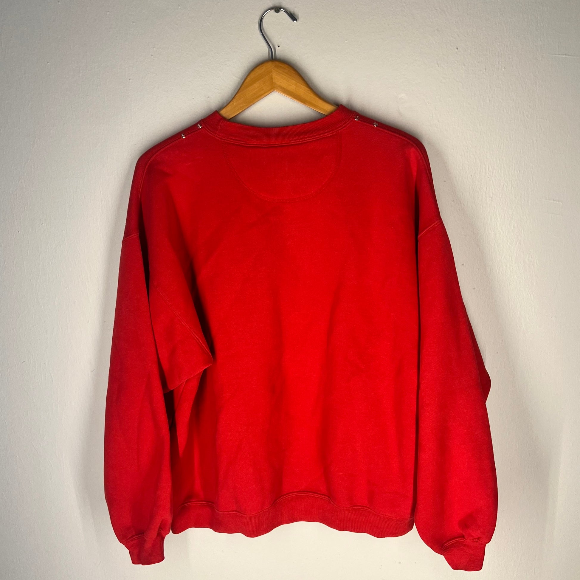 Back view of sweatshirt (solid red, no graphic)