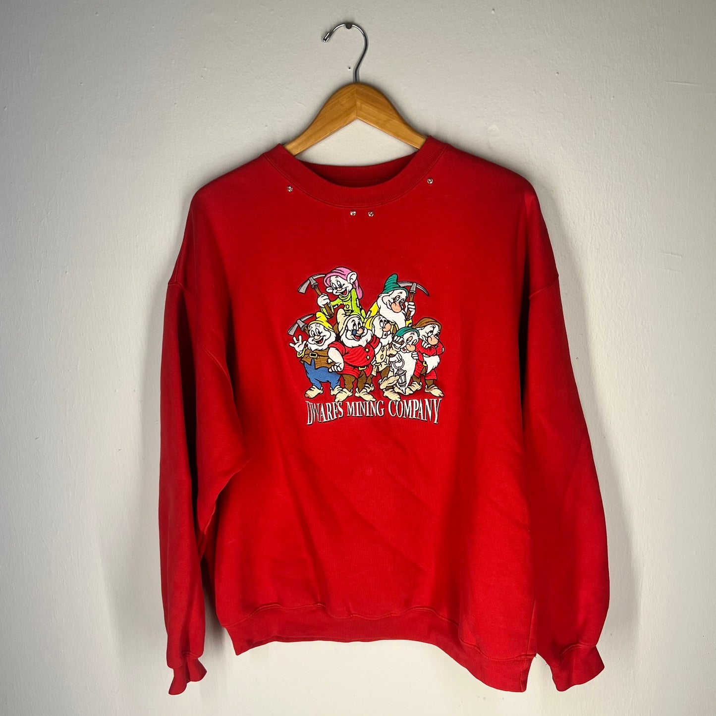 Front view of Disney Dwarfs Mining Company embroidered sweatshirt (red, XL)