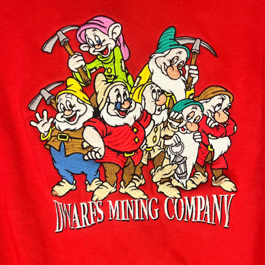 Close-up of embroidered Seven Dwarfs “Dwarfs Mining Company” front graphic
