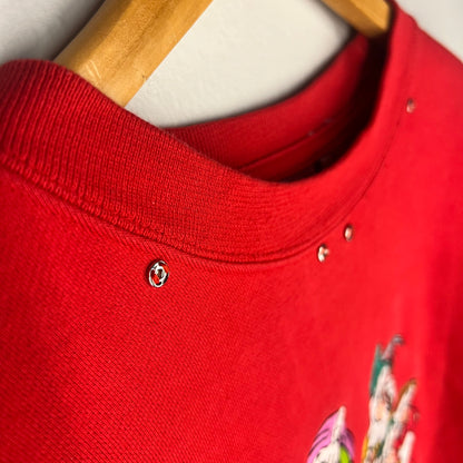 Close-up of neckline with rhinestone stud accents