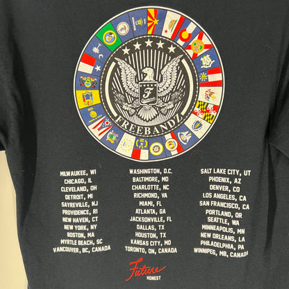 Detail of tour stop text and Freebandz logo on lower back hem