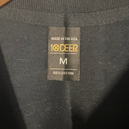 Size and brand tag showing 10.Deep logo, Made in USA, and Medium size