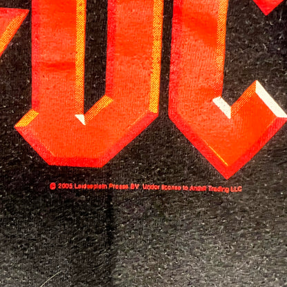 Zoomed-in detail showing 2005 licensing print below AC/DC graphic