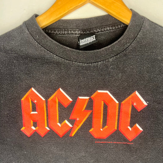 Close-up of AC/DC red logo on chest of 2005 vintage band t-shirt