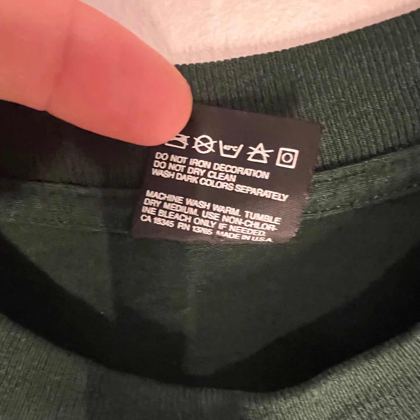 Interior care label showing Made in USA origin and wash instructions.