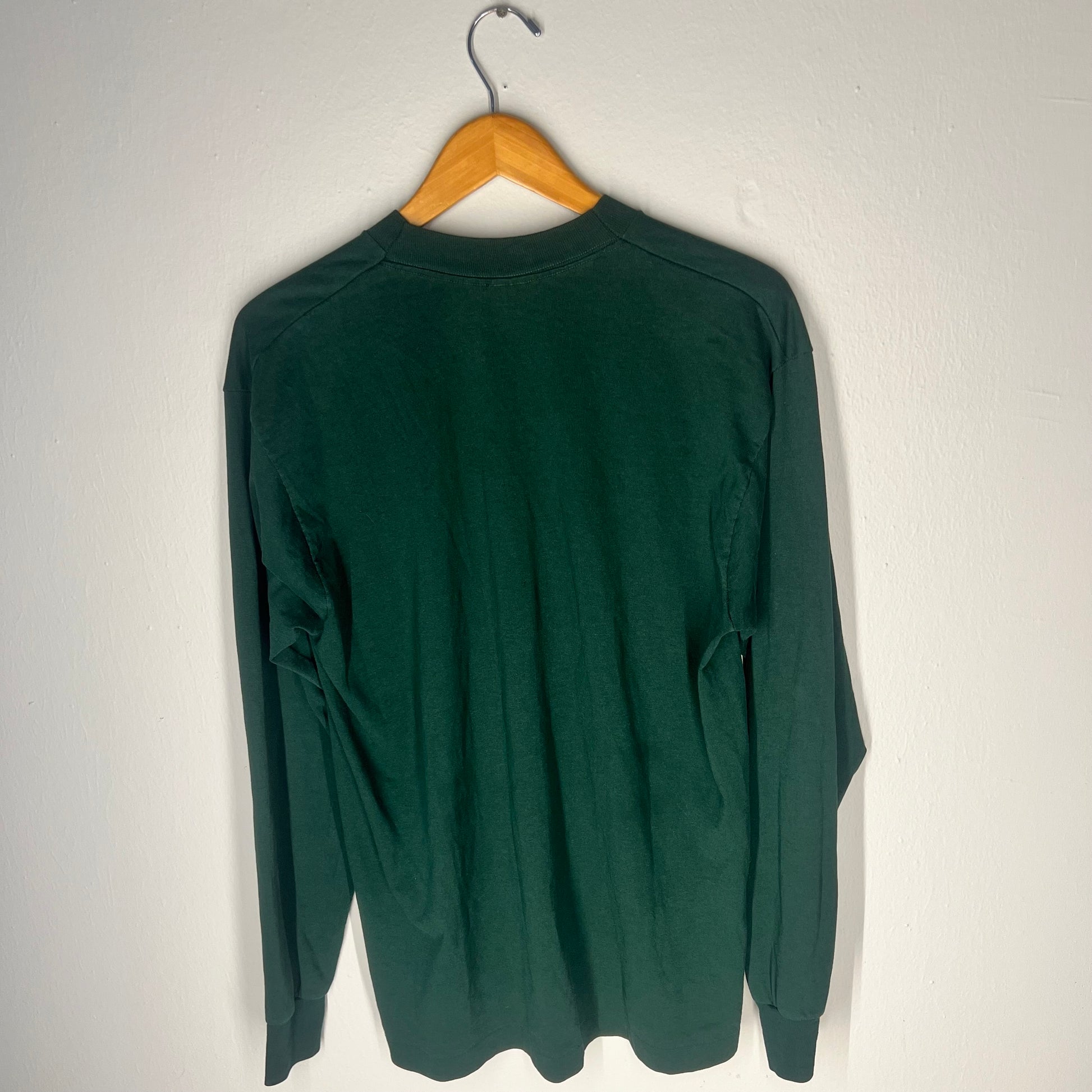 Back view of Nirvana long sleeve tee showing clean blank backside and sleeve length.