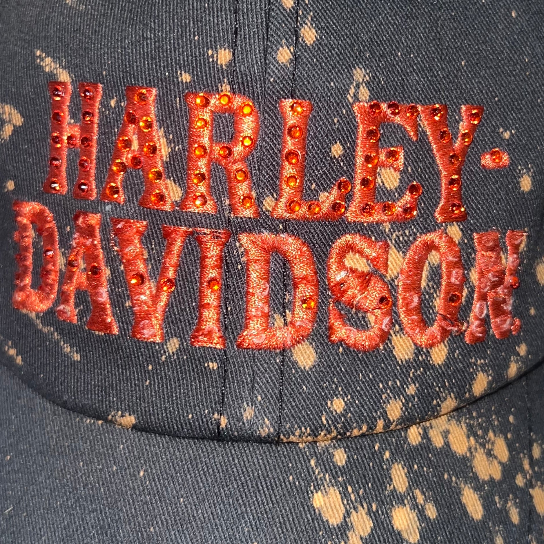 Close-up of red embroidered Harley-Davidson logo on crown
