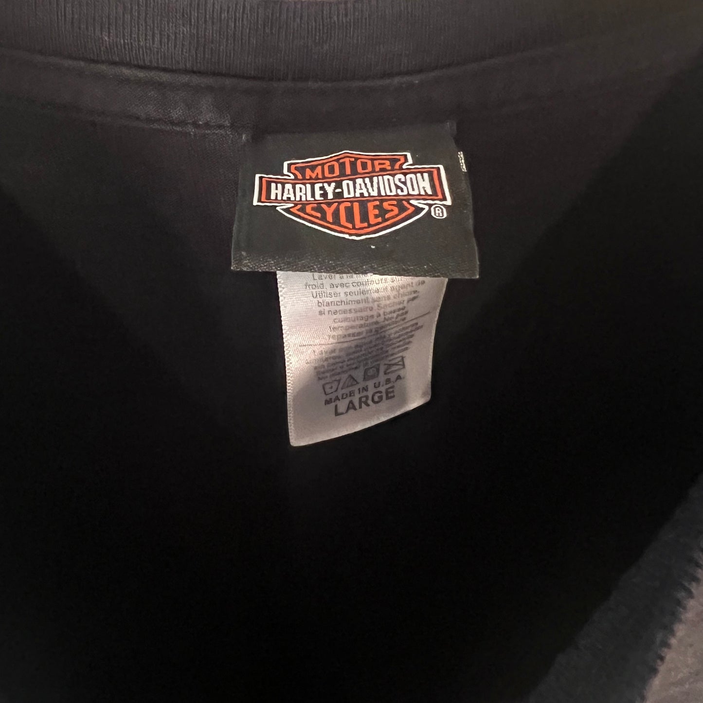 Harley-Davidson woven neck tag with size and origin details