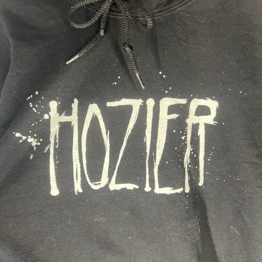 Close-up of Hozier white splatter-style chest print