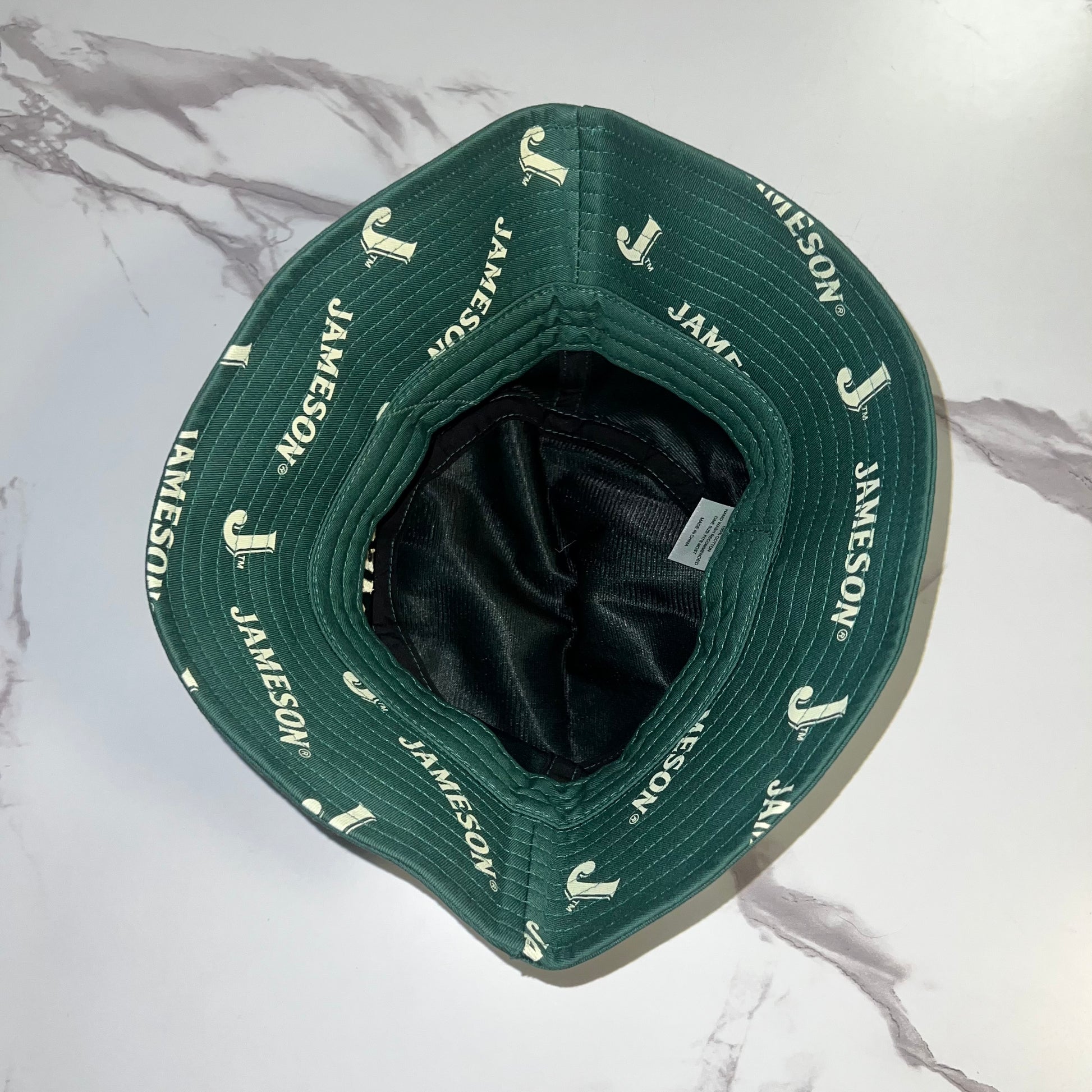 Interior view of brim print with Jameson logo pattern