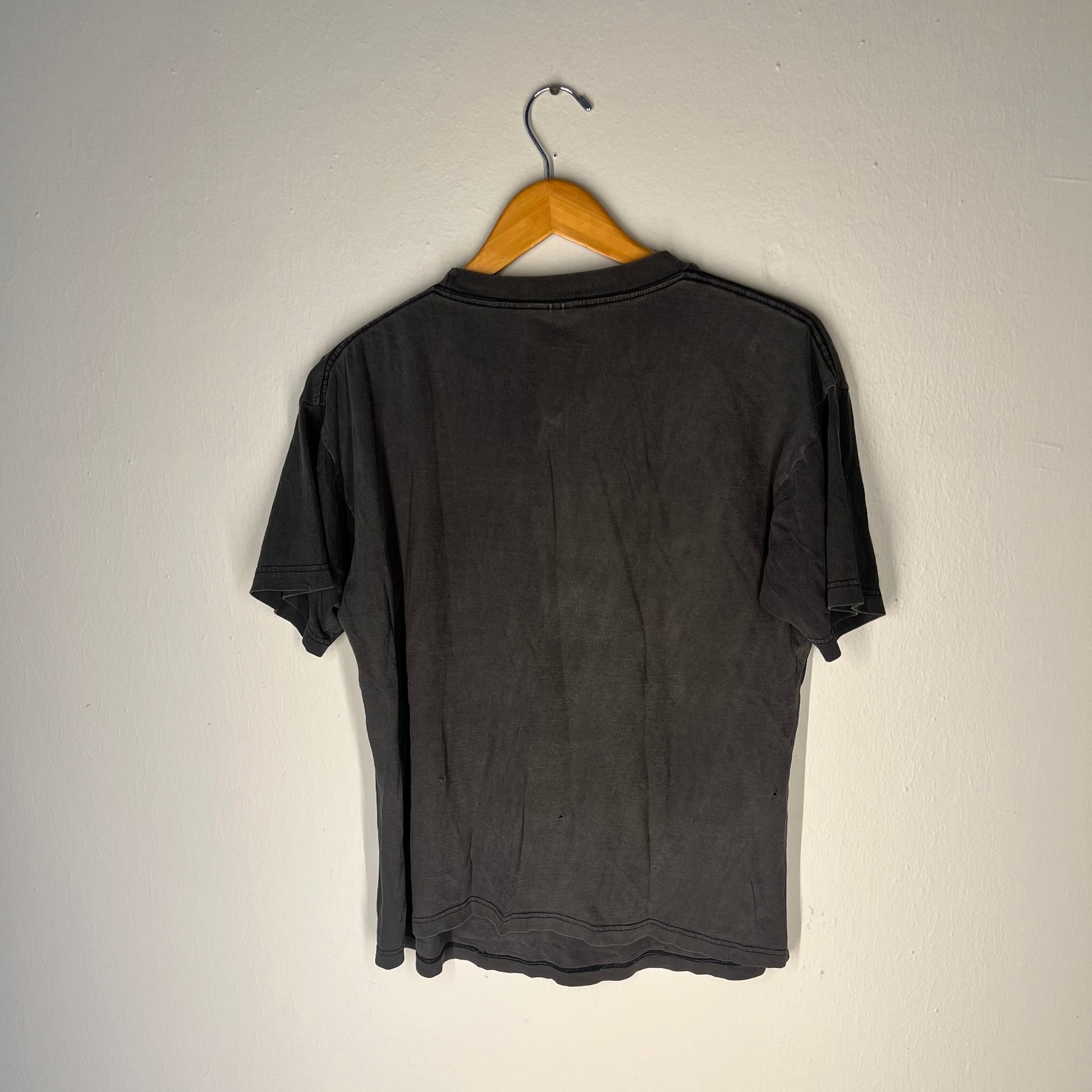 Back view showing fade and pinholes