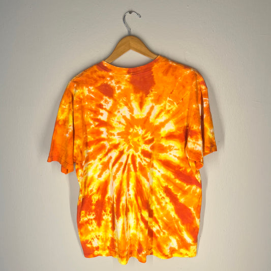 Back view of orange and yellow tie-dye T-shirt with vibrant spiral pattern