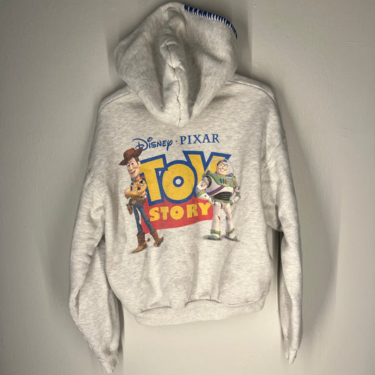 Close-up of Toy Story back graphic with Woody and Buzz