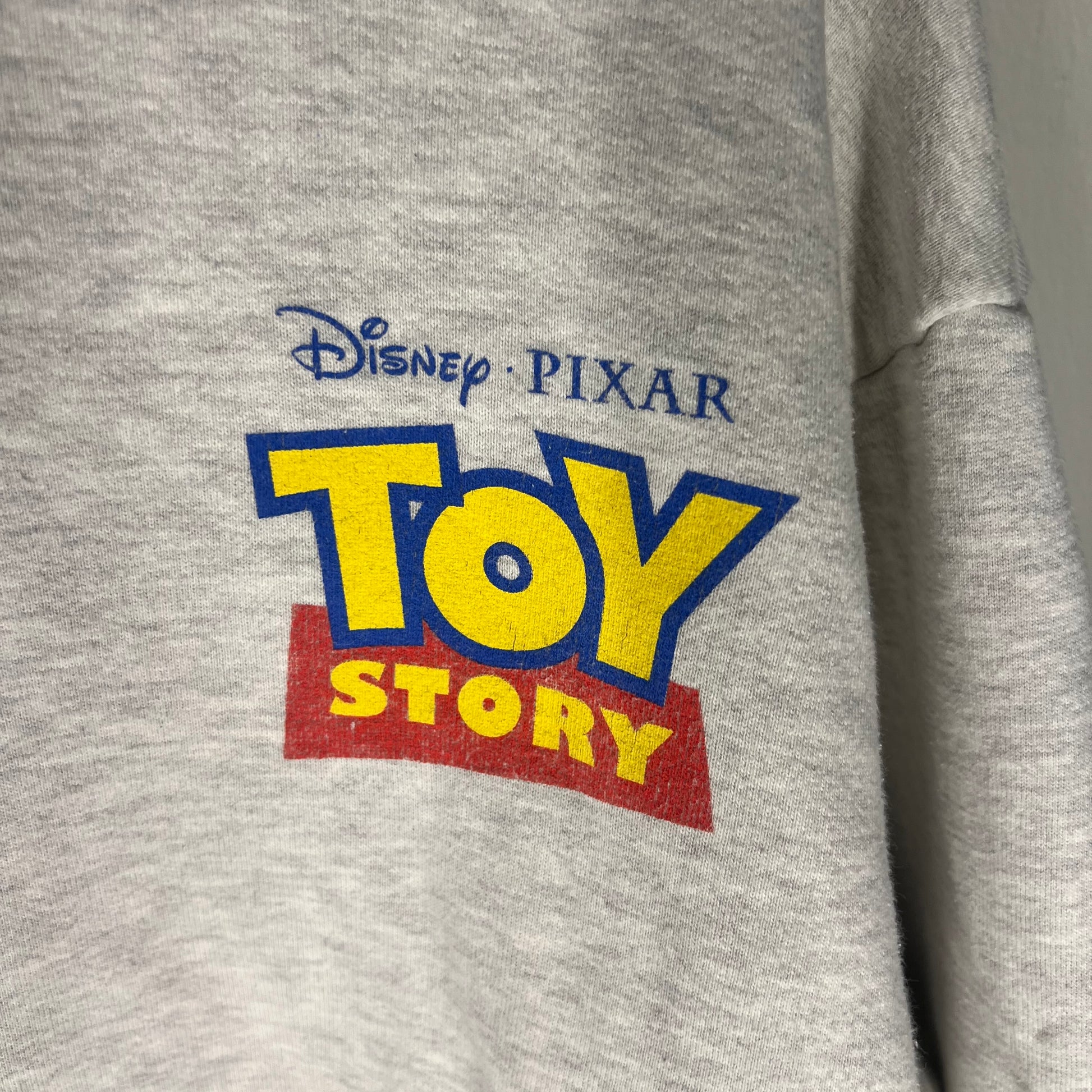Close-up of Disney Pixar Toy Story print on front chest
