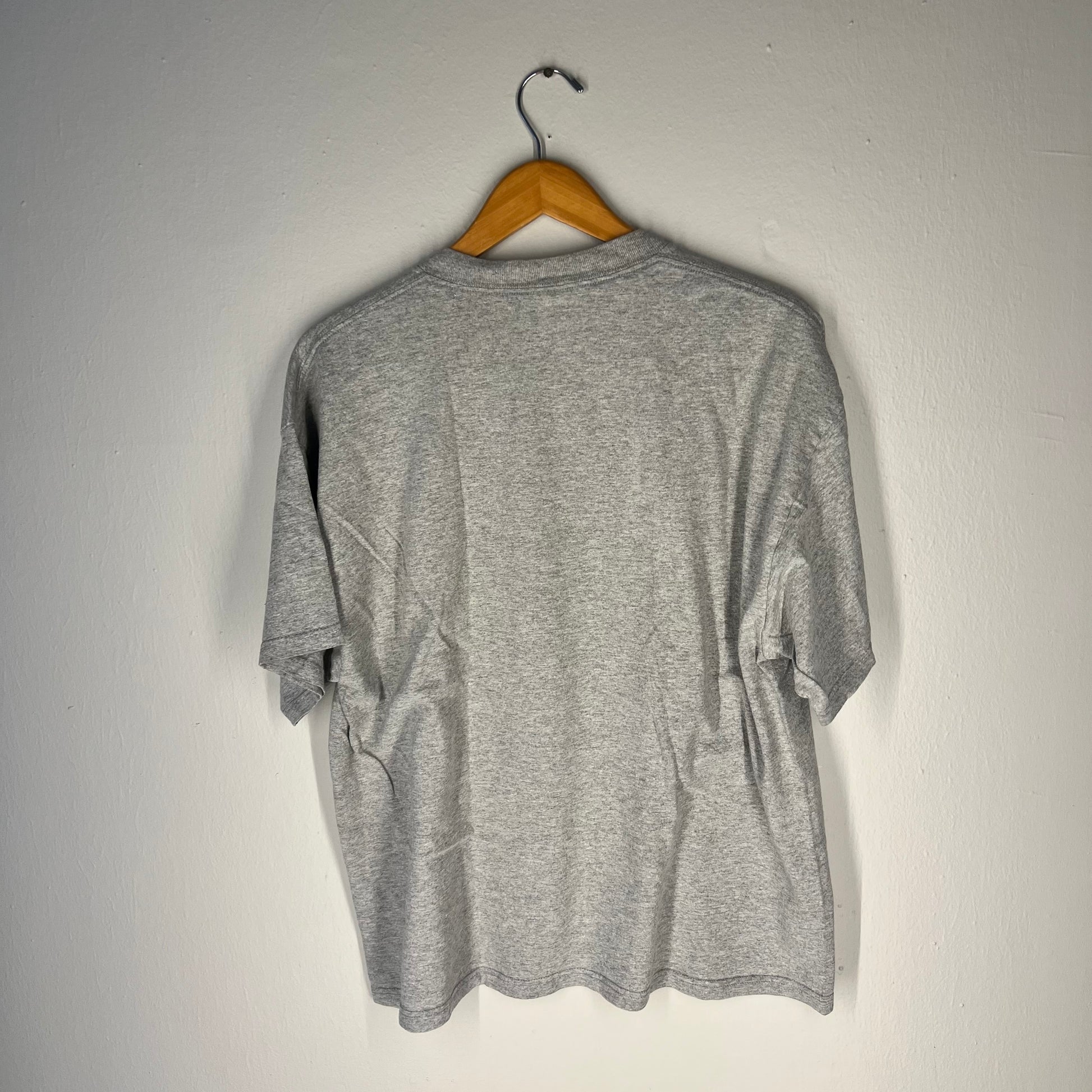Back view of grey Simpsons Springfield Unathletic Dept T-shirt plain with no print