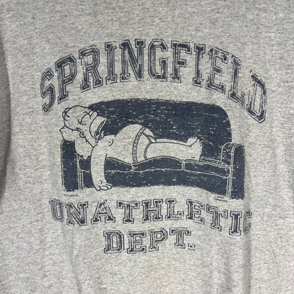 Close-up of Simpsons Springfield Unathletic Dept graphic with Homer Simpson on couch