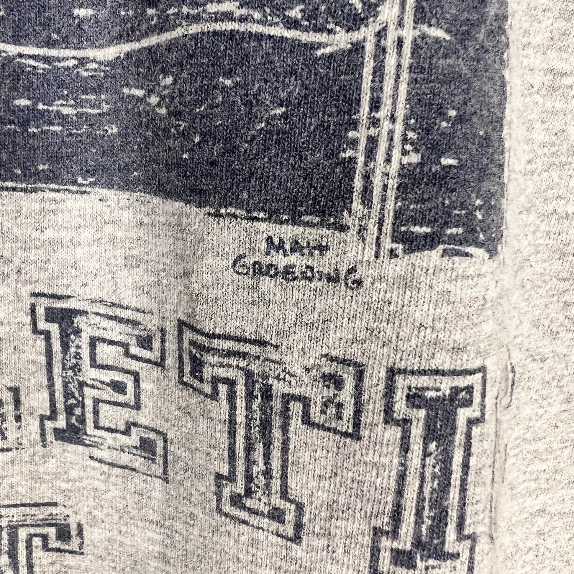 Matt Groening signature close-up on Simpsons Springfield Unathletic Dept tee