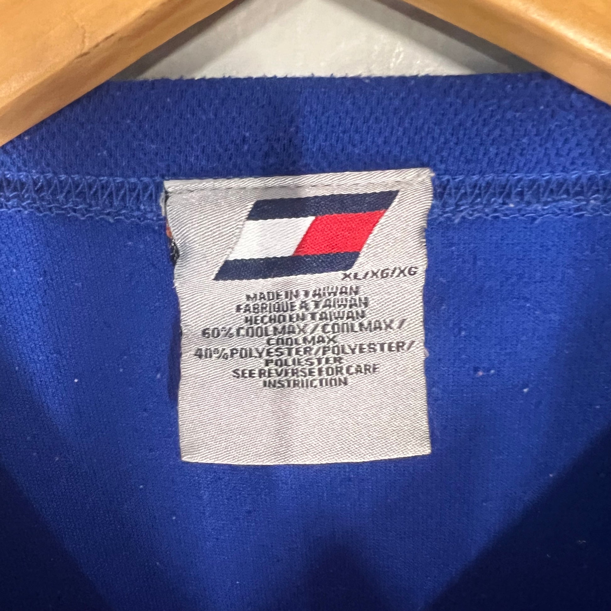 Size XL tag showing 60% Coolmax and 40% polyester, made in Taiwan