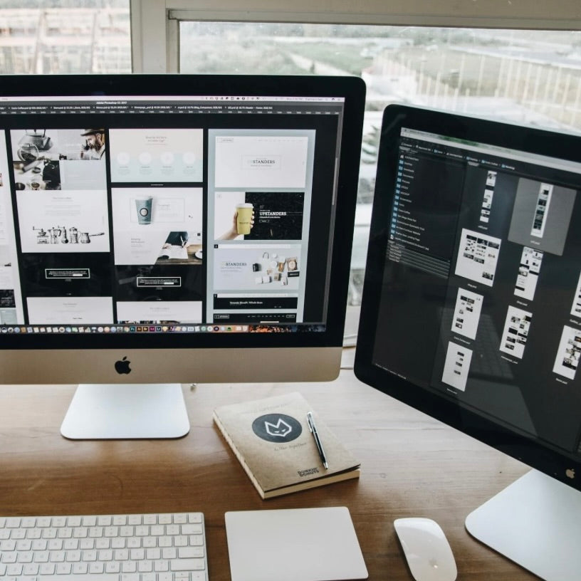 Dual-monitor web design and automation workspace used for branding strategy consultations with SWOProjects creative studio