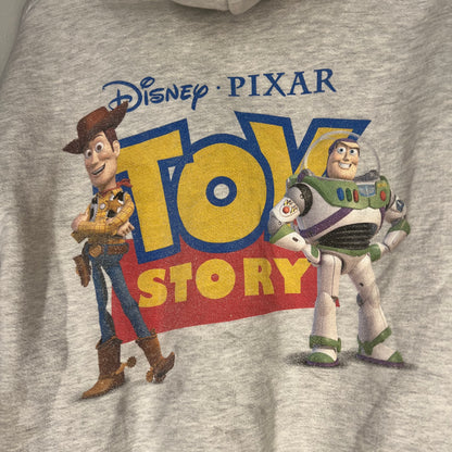 Close-up of Toy Story back graphic with Woody and Buzz